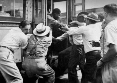 A-white-mob-attempts-to-abduct-a-black-man-Red-Summer-1919